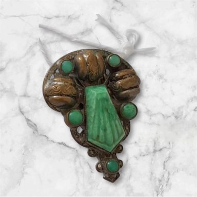 Neiger Bros carved green stone dress clip
